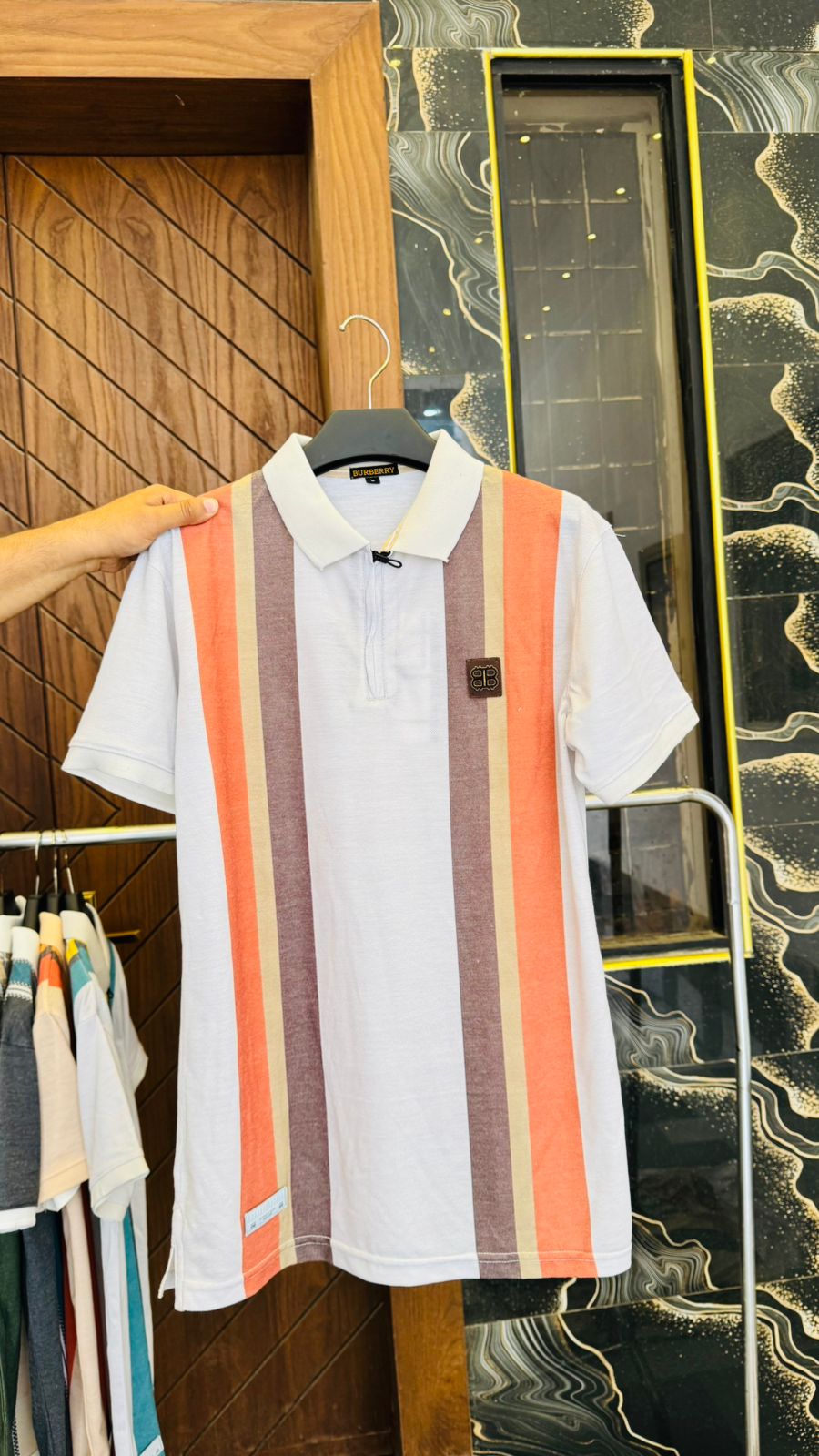 White Polo with Bold Vertical Stripes